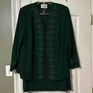 Beautiful 2 piece green suit by Nolan Millet